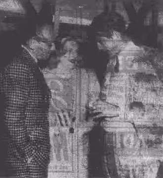 "Here is Director John Boulting (right) talking to William Hartnell and Hermione Baddeley on the Palace Pier for shooting of the film Brighton Rock." (1947)