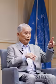 Author and actor George Takei speaks to local school groups at the Library of Congress, May 10, 2024. Photo by Shawn Miller/Library of Congress. Note: Privacy a