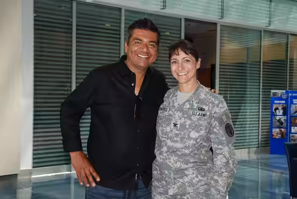 George Lopez and Col. Menetrez director for the Center for the Intrepid, pose for a photo. Photo by Maria Gallegos, BAMC Public Affairs. (2010)