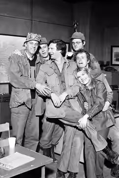Cast of MAS*H television program. Clockwise, from left, are McLean Stevenson, Larry Linville, Alan Alda, Gary Burghoff, Wayne Rogers, Loretta Swit. (1973)