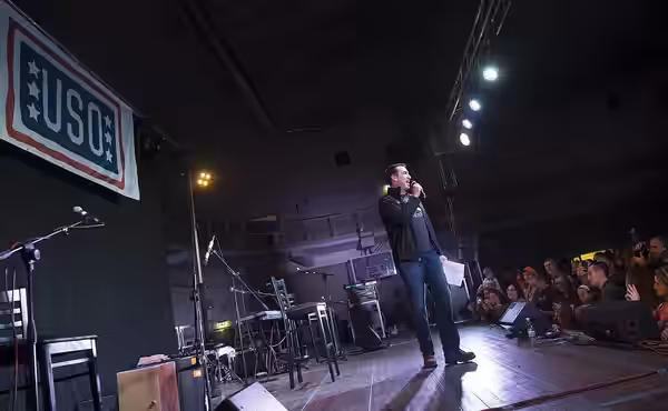 Comedian Rob Riggle, performs at a USO show in Vicenza, Italy, Dec. 7, 2014. (DOD photo by D. Myles Cullen/Released)