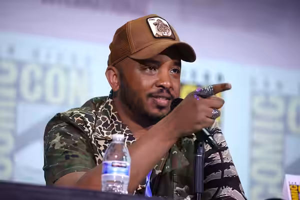 Justin Simien speaking at the 2023 San Diego Comic Con International, for "Collider: Directors on Directing", at the San Diego Convention Center in San Diego, C