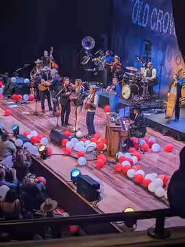 Molly Tuttle performs with Old Crow Medicine Show on New Year's Eve at Ryman Auditorium in downtown Nashville, Tennessee. (2024)
