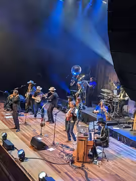 Molly Tuttle performs with Old Crow Medicine Show on New Year's Eve at Ryman Auditorium in downtown Nashville, Tennessee. (2023)