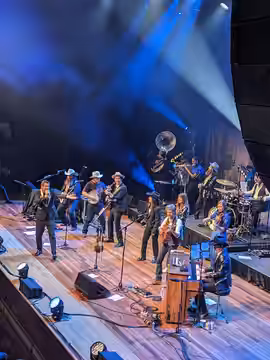 Molly Tuttle performs with Old Crow Medicine Show on New Year's Eve at Ryman Auditorium in downtown Nashville, Tennessee. (2023)