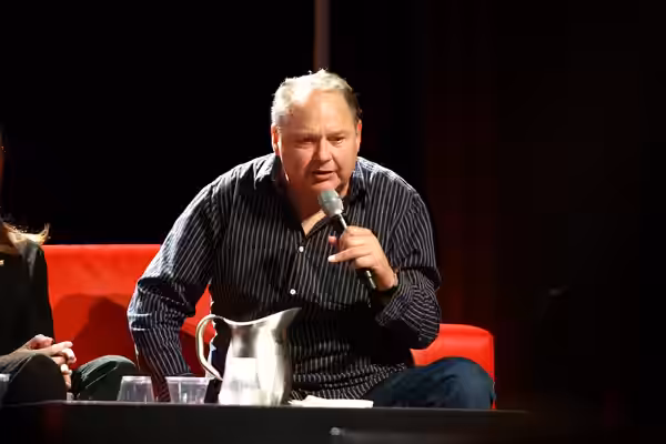 Stephen Furst speaking at the 2013 Phoenix Comicon at the Phoenix Convention Center in Phoenix, Arizona. Please attribute to Gage Skidmore if used elsewhere.