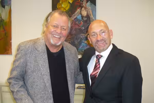 Intergovernmental Organization Secretary-General, H.E. Irving levance with famed actor David Soul. (2013)