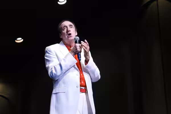 Honorary Marine Cpl. Jim Nabors sings ‘Silent Night’ during the Second Annual Na Mele o na Keiki, 'Music for the Children' Dec. 9 at the Neal S. Blaisdell Cente (2009)