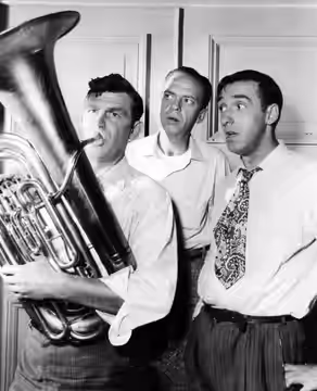 Publicity photo of Andy Griffith, Don Knotts and Jim Nabors from The Andy Griffith Show. Andy tries to help out the town band, but Barney and Gomer aren't so su