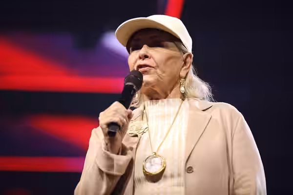 Roseanne Barr speaking with attendees at the 2023 AmericaFest at the Phoenix Convention Center in Phoenix, Arizona.