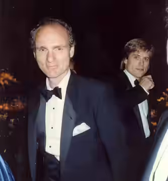 Joe Regalbuto and unknown handsome guy in the background at the Governor's Ball following the 41st Annual Emmy Awards, 9/17/89 - Permission granted to copy, pub (1989)