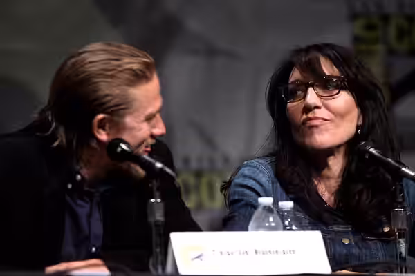 Charlie Hunnam &amp; Katey Sagal speaking at the 2012 San Diego Comic-Con International in San Diego, California. Please attribute to Gage Skidmore if used else