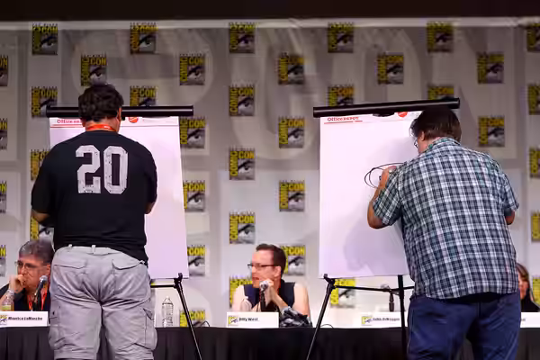 Peter Avanzino and Matt Groening at the 2011 San Diego Comic-Con International in San Diego, California, drawing Bender. Please attribute to Gage Skidmore if us
