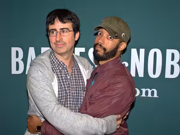 John Oliver and Wyatt Cenac at Barnes &amp; Noble Union Square for the launch of Earth (The Book), the 2010 book from the writers of The Daily Show