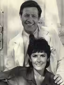 Charles Siebert stars as Dr. Stanley Riverside and Marcia Rodd plays his wife, E.J., in an episode of "Trapper John, M.D.," in which a patient admitted to the h (1982)