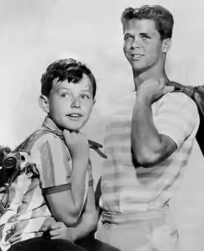 Photo of Jerry Mathers (Theodore "Beaver" Cleaver) and Tony Dow (Wally Cleaver) from the television program Leave It to Beaver. (1961)