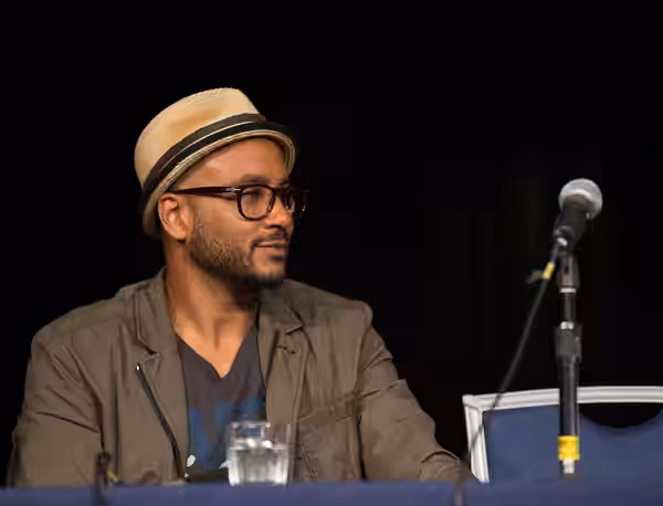 Cirroc Lofton as member of a panel at a Star Trek DS9 convention (2013)