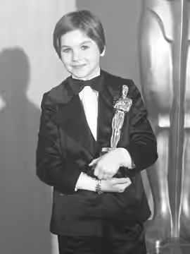 Tatum O'Neal, holding her Oscar for "Paper Moon," at the 46th Annual Academy Awards. (1974)