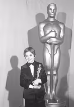 Tatum O'Neal, holding her Oscar for "Paper Moon," at the 46th Annual Academy Awards. (1974)