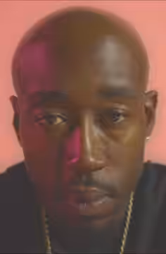 A close-up shot of Freddie Gibbs from a promotional video