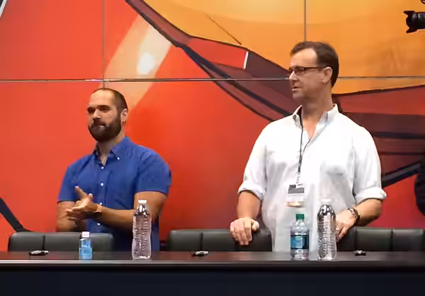 Marco Ramierz and w:Doug Petrie at a signing for Daredevil at the w:Marvel Comics booth at w:New York Comic Con 2015.
