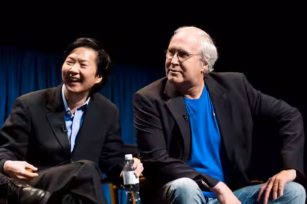 Ken Jeong and Chevy Chase at a panel for Community at PaleyFest 2010.