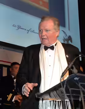 Master of Ceremonies, Jon Voight, jokes with the crowd before the presentation of the George M. Van Cleave Military Leadership Award during the 45th Annual Gold