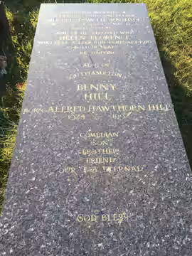 Marble slab covering the tomb of Alfred Hawthorne "Benny" Hill. (2016)