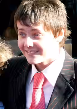 A photograph of Tyger Drew-Honey taken at the BAFTAs in 2009.