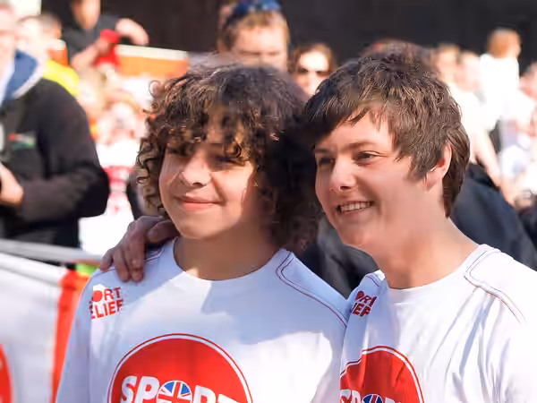 A photograph of Daniel Roche and Tyger Drew-Honey at the Sport Relief Mile 2012 in London.
