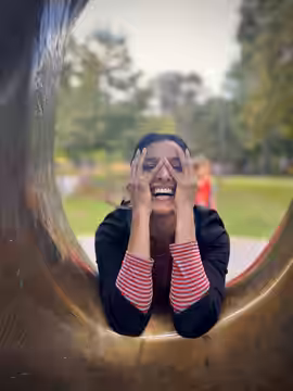 Shelley Conn looking through a Henry Moore sculpture in Toronto, Canada. (2022)