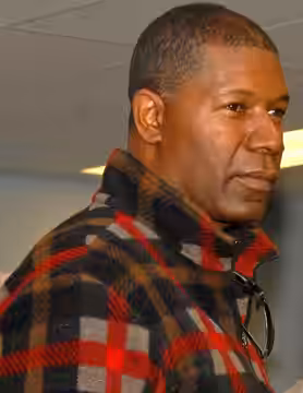 Actor Dennis Haysbert, cast member of the television series, "The Unit," poses for a photo during a USO Spring Troop visit to Forward Operating Base Fenty, Afgh (2009)