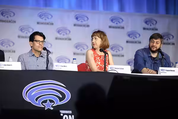 Dan Mintz, Kristen Schaal and Eugene Mirman speaking at the 2022 WonderCon, for "The Bob's Burgers Movie", at the Anaheim Convention Center in Anaheim, Californ