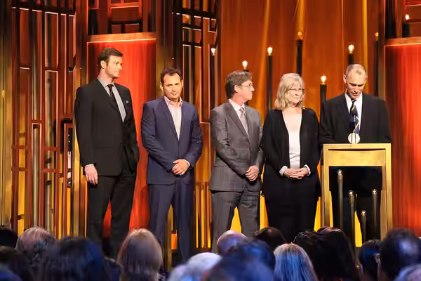 Joel Fields, writer for The Americans, accepts the series' Peabody on stage with (from left to right) Costa Ronin, Lev Gorn, Richard Thomas and Mary Rae Thewlis (2015)