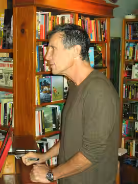 Author Michael Cunningham signing in a NYC bookstore, Oct. 2005.
