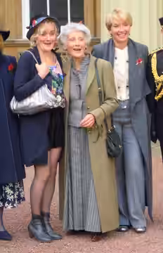 Actress Phyllida Law (centre) flanked by her daughters Sophie Thompson and Emma Thompson (Investiture at Buckingham Palace when Phyllida Law received the OBE). (2014)