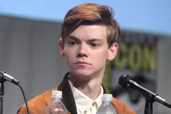Ki Hong Lee and Thomas Brodie-Sangster speaking at the 2015 San Diego Comic Con International, for "Maze Runner: The Scorch Trials", at the San Diego Convention