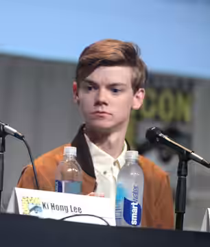 Ki Hong Lee and Thomas Brodie-Sangster speaking at the 2015 San Diego Comic Con International, for "Maze Runner: The Scorch Trials", at the San Diego Convention