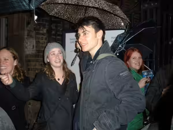 Actor Harry Lloyd emerges from the stage door. (2010)