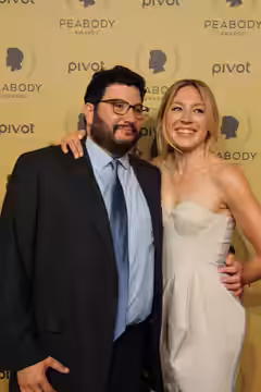 The Knick Creator Jack Amiel and Juliet Rylance, who plays Cornelia Robinson on The Knick, pose for a picture on the red carpet. (2015)