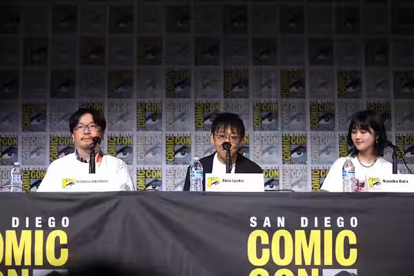 Toshihisa Yokoshima, Akio Iyoku and Nanoka Hara speaking at the 2023 San Diego Comic Con International, for "Sand Land", at the San Diego Convention Center in S