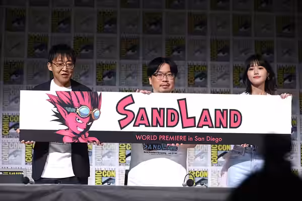 Toshihisa Yokoshima, Akio Iyoku and Nanoka Hara speaking at the 2023 San Diego Comic Con International, for "Sand Land", at the San Diego Convention Center in S