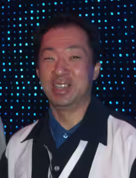 Me and Koji Kondo. We're saying "Wii!" to the camera. (2006)