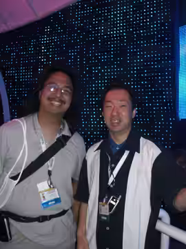 Me and Koji Kondo. We're saying "Wii!" to the camera. (2006)