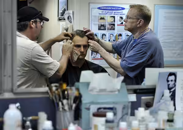 Benjamin Walker, who plays the titular role in the film “Abraham Lincoln: Vampire Hunter” gets into character before touring USS Abraham Lincoln. (2012)