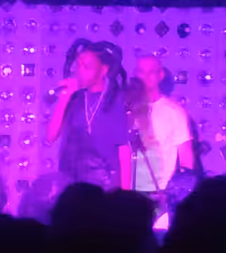 Dua Saleh (left) performing at Baby's All Right in Brooklyn, New York, on April 28, 2022.