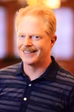 Jesse Tyler Ferguson photographed at Sardi's in 2022