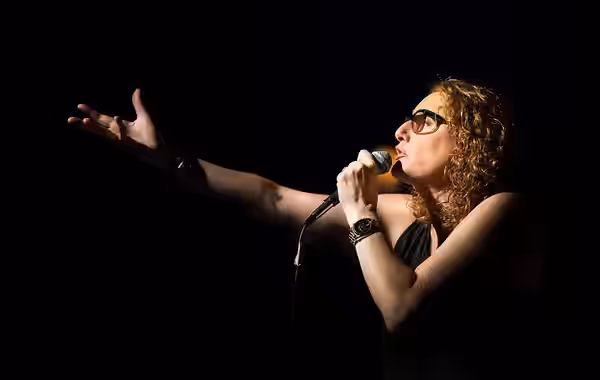 Judy Gold performing on stage (2024)