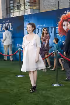 Kelly Macdonald, who voices Merida, arrives at the premiere of Disney Pixar's new blockbuster Brave at the Dolby Theatre in Los Angeles. Credit: Matt Petit / Fe (2012)