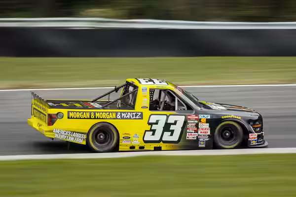 JUNE 27, 2025 - Frankie Muniz, driver of the Morgan &amp; Morgan Ford F-150, competes in practice for the LiUNA! 150 at Lime Rock Park in Lakeville, Connecticut